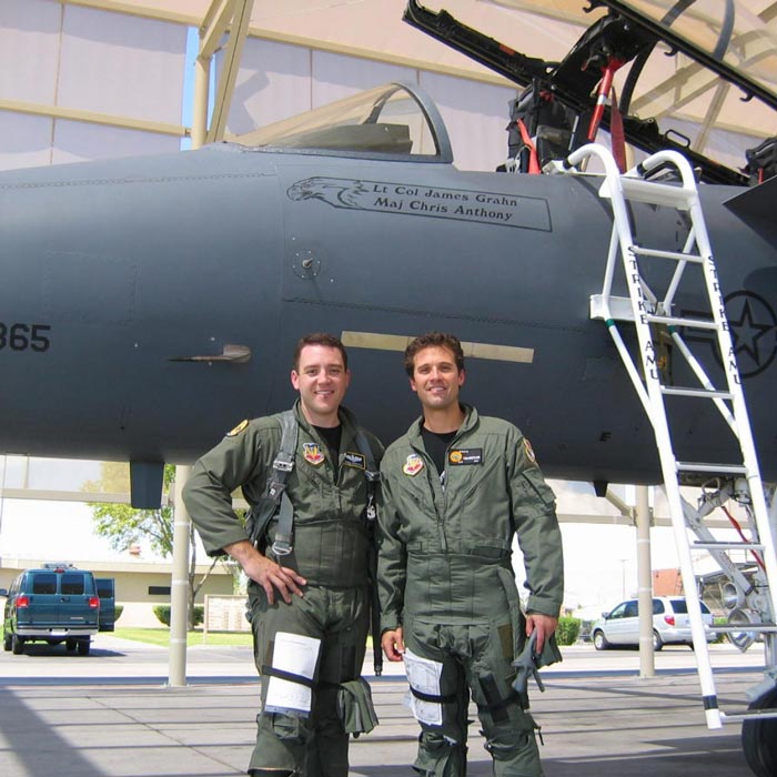 tom in front of plane